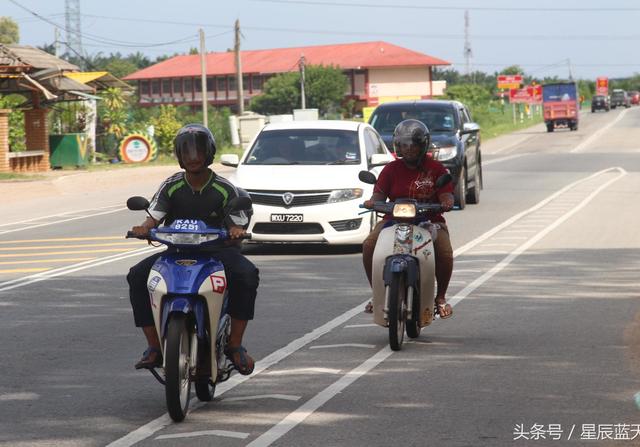马来西亚 摩托车白天必须开大灯