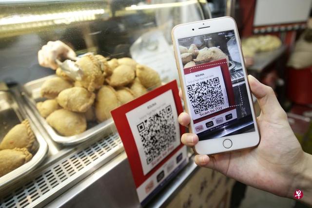 新加坡向中国学习，小贩中心推出QR码电子付款方式
