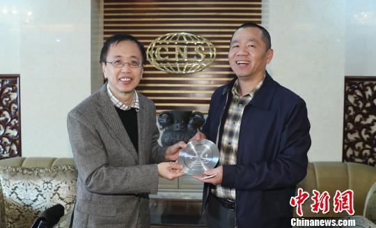 新加坡新闻代表团一行参访中新社