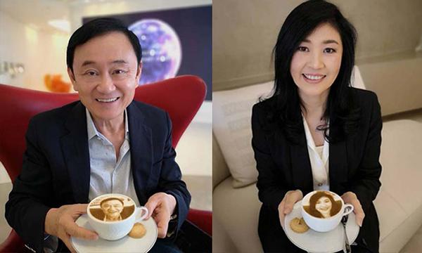 泰国前总理他信和英拉近照再度曝光，两人一道现身机场喝咖啡