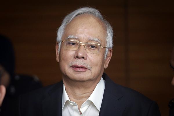 马前总理纳吉布三天内两次被传唤，家中被曝查出1.2亿现金