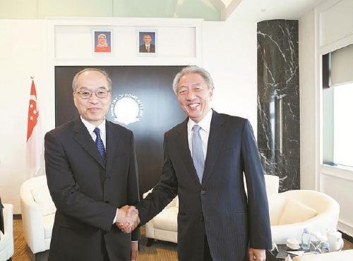 张军会见新加坡副总理张志贤