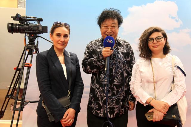 张俊以率《中国大爱万里行》为外交部黑龙江全球推介助力