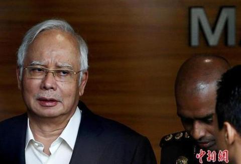 马来西亚前总理纳吉布被控滥权，若罪成最高可判20年监禁