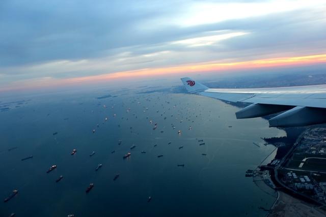 飞越新加坡瞬时大片 蓝色海湾 夕阳霞光 中国南海为何星罗棋布