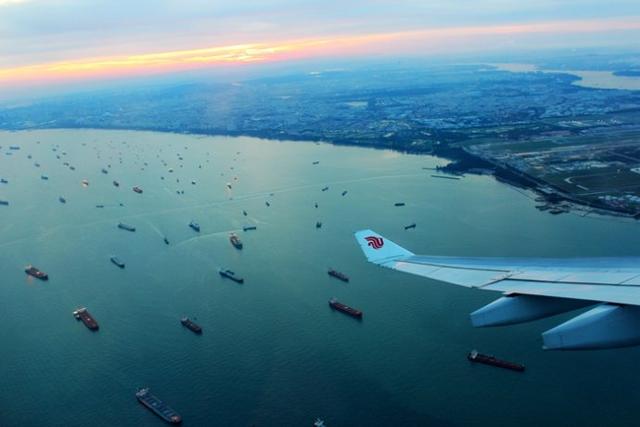 飞越新加坡瞬时大片 蓝色海湾 夕阳霞光 中国南海为何星罗棋布