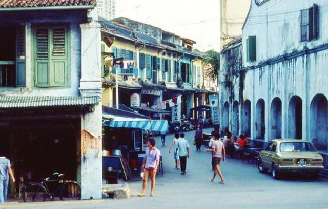 1983年的新加坡：自行车常见，街头还有卖艺人