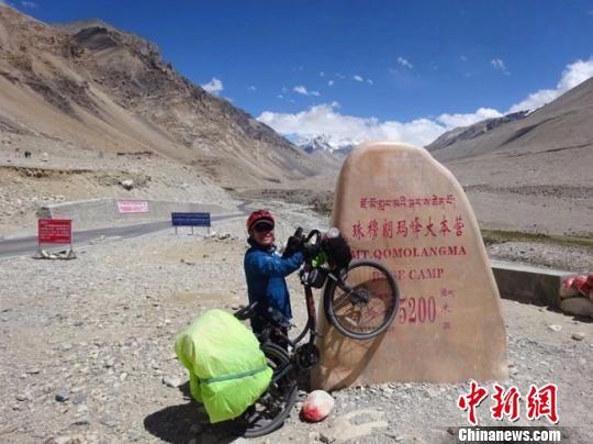 陇南六旬骑行者游10余国 数十万字游记励众人逐梦