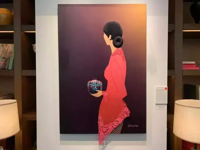 戴安娜王妃御用新加坡服装设计师回故土办展