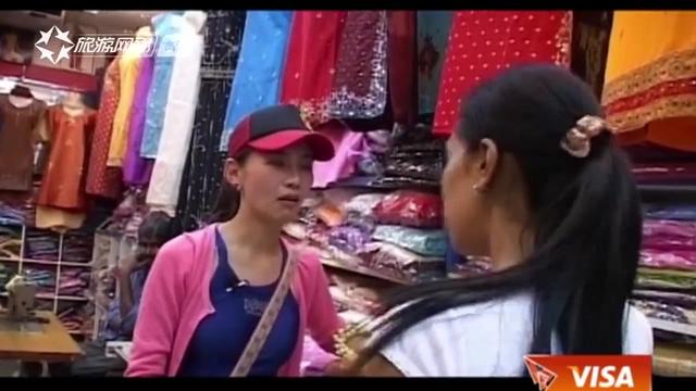 旅行：新加坡购物不还价？主持人看中一件漂亮的纱衣，一分不能少