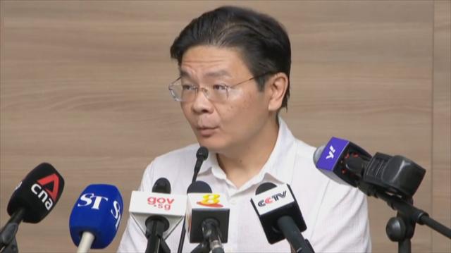 新加坡官员批英国瑞士消极抗疫 世界面临多个疫情暴发点