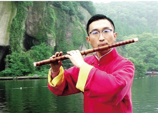 他26年与国乐形影不离 汤幸：将水乡笛派发扬光大