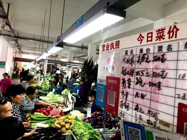 互联网巨头的百亿红包 抢不走生鲜摊贩的生计
