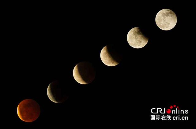 “超级月亮”和“月全食”同时在夜空上演
