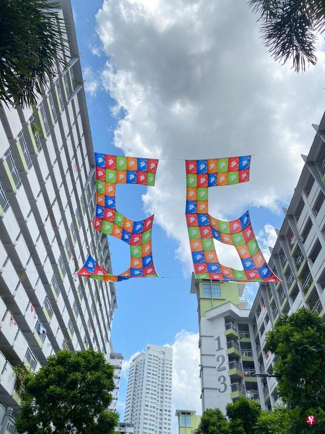 新加坡建国一代耗时一个月 92面国旗缝制56造型