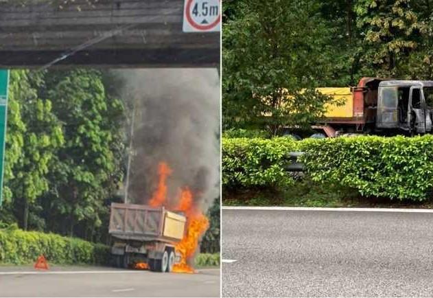 新加坡倾斗罗厘在中央快速公路上车头起火狂烧