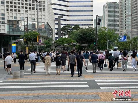 疫情后韩国首次接待外国旅游团 检测阴性可免隔离