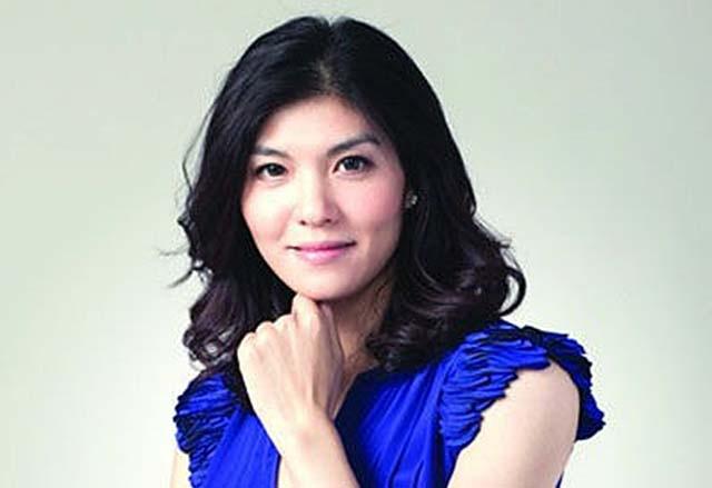 2003年，奥运冠军庄泳二婚嫁大8岁的队友，在英国诞下儿女