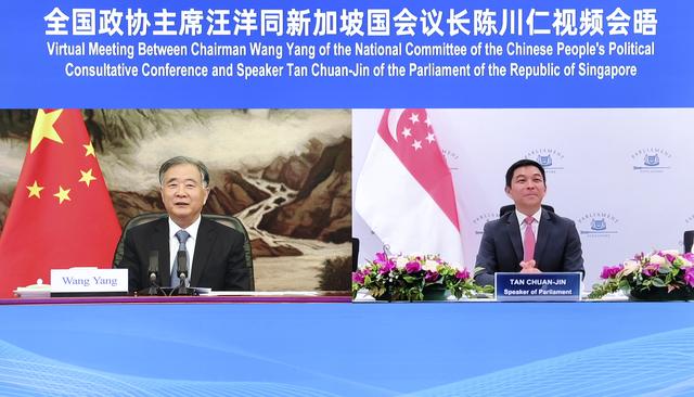（时政）汪洋会见新加坡国会议长陈川仁